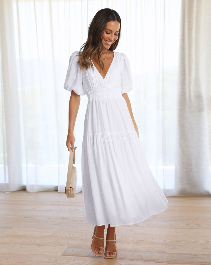Kleid mit V-Ausschnitt und Puffärmeln