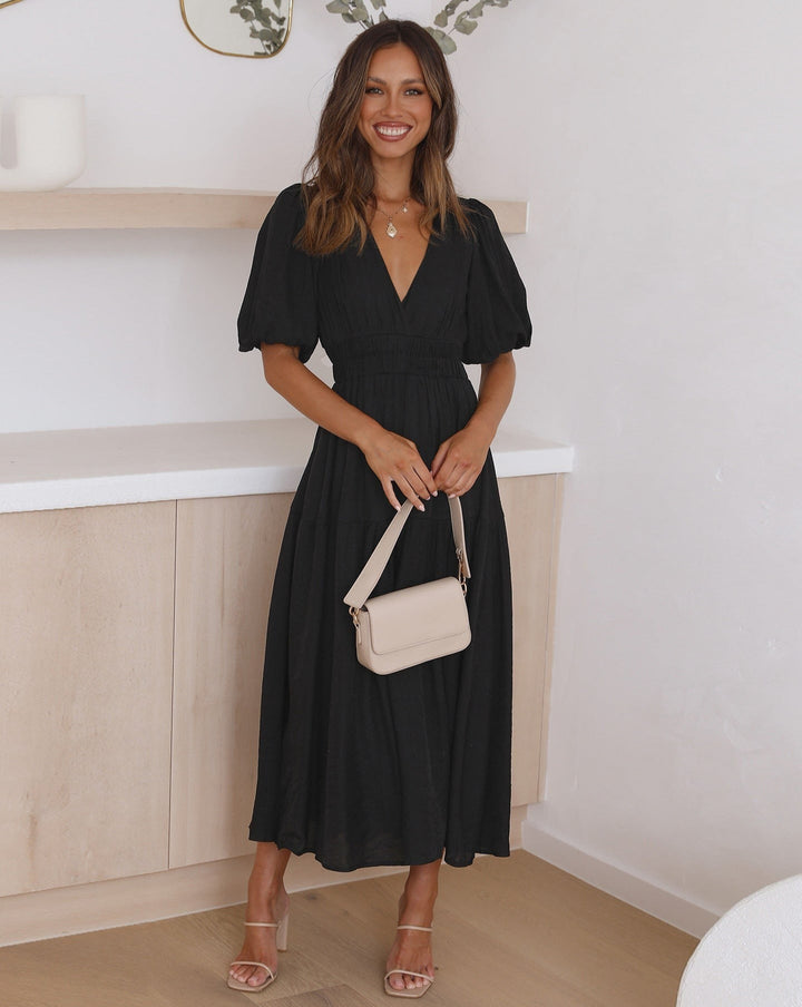 Kleid mit V-Ausschnitt und Puffärmeln