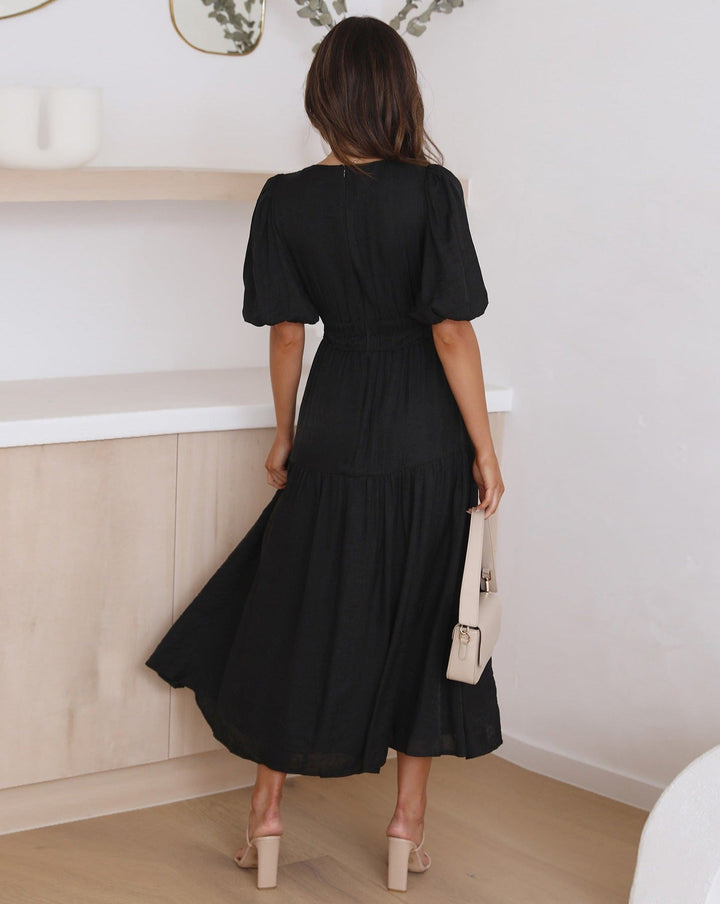 Kleid mit V-Ausschnitt und Puffärmeln