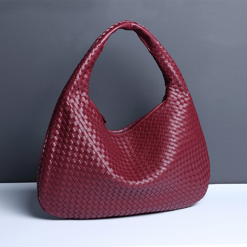 Tasche für Damen mit Reißverschluss und strukturierter Haptik