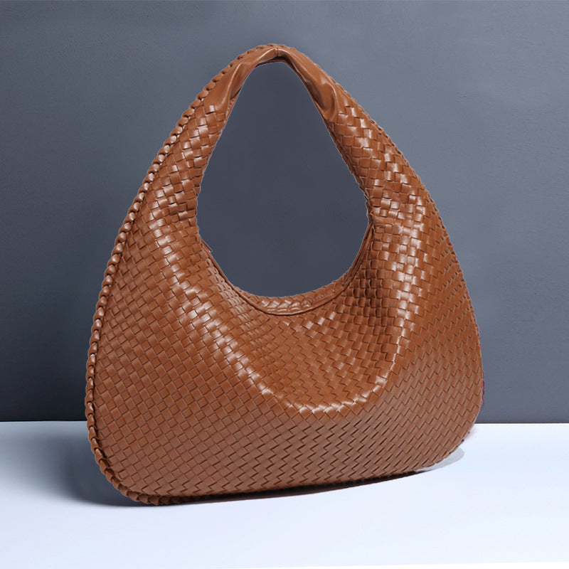 Tasche für Damen mit Reißverschluss und strukturierter Haptik