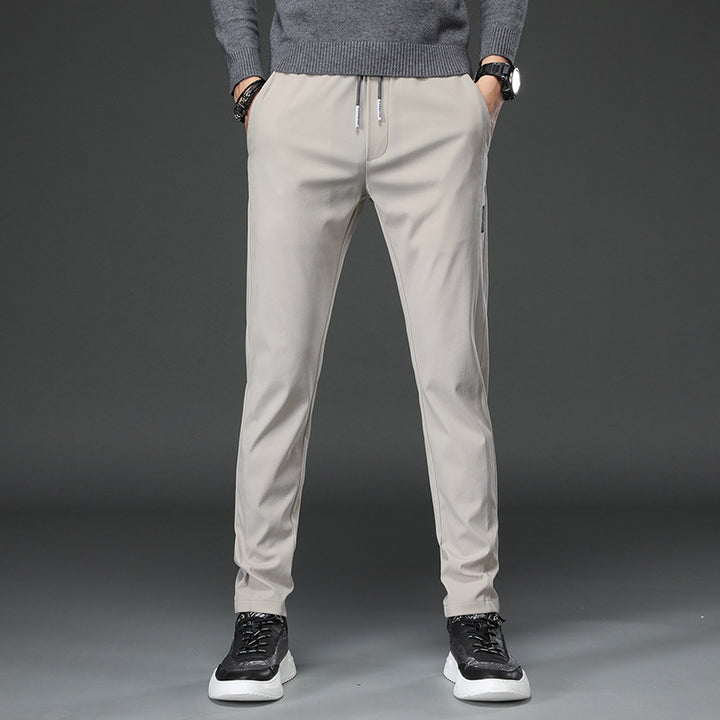 Herren schmal geschnittene Sporthose mit elastischem Bund und praktischen Reißverschlusstaschen Aliams