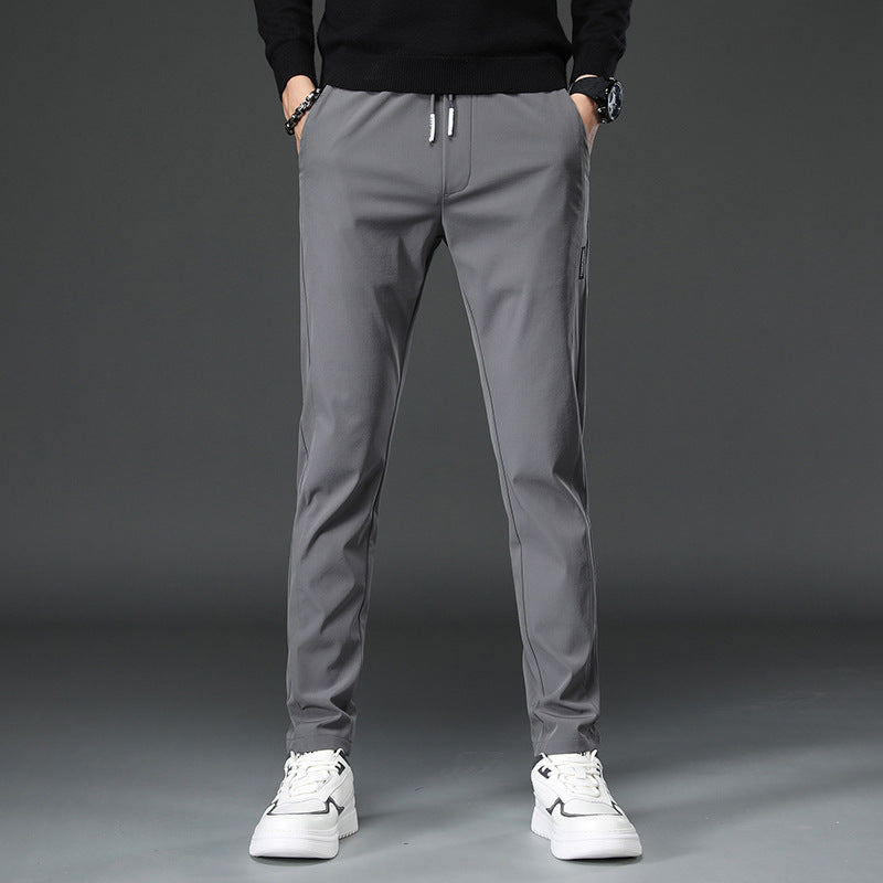 Herren schmal geschnittene Sporthose mit elastischem Bund und praktischen Reißverschlusstaschen Aliams