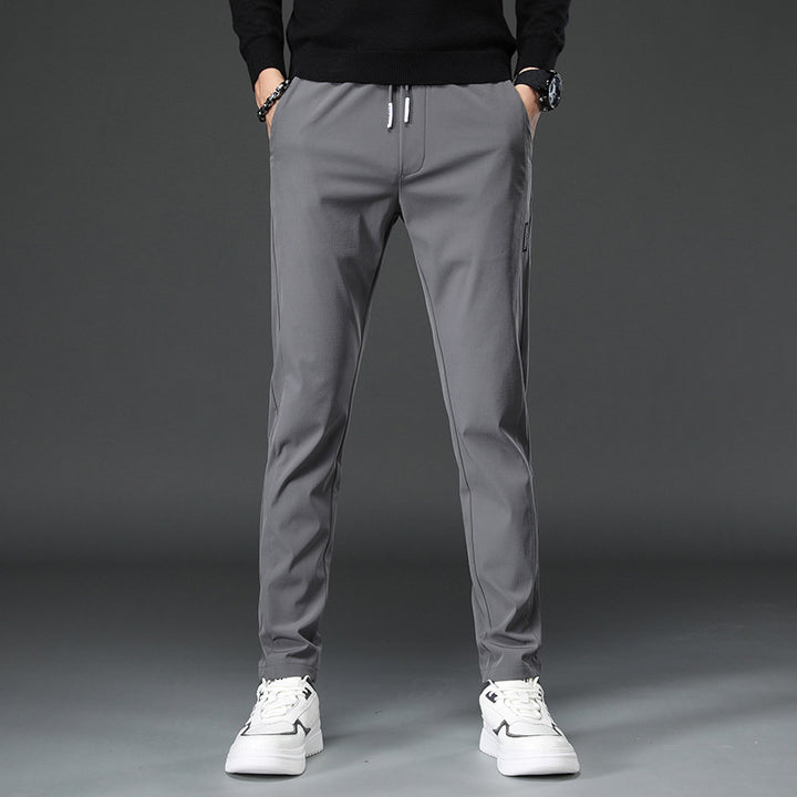 Herren schmal geschnittene Sporthose mit elastischem Bund und praktischen Reißverschlusstaschen Aliams