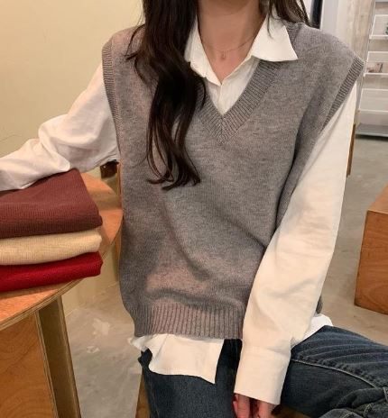 Elegante ärmellose Strickjacke