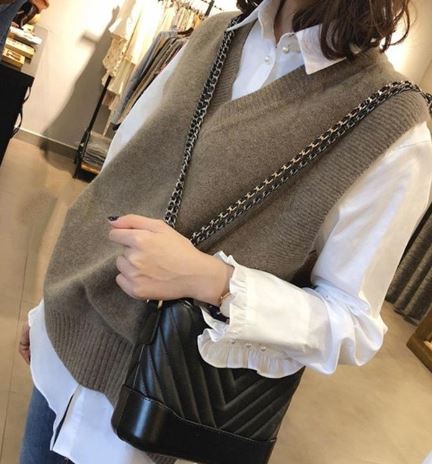 Elegante ärmellose Strickjacke